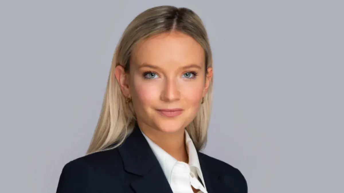 Colour head and shoulders photo of Antonia Church looking at the camera