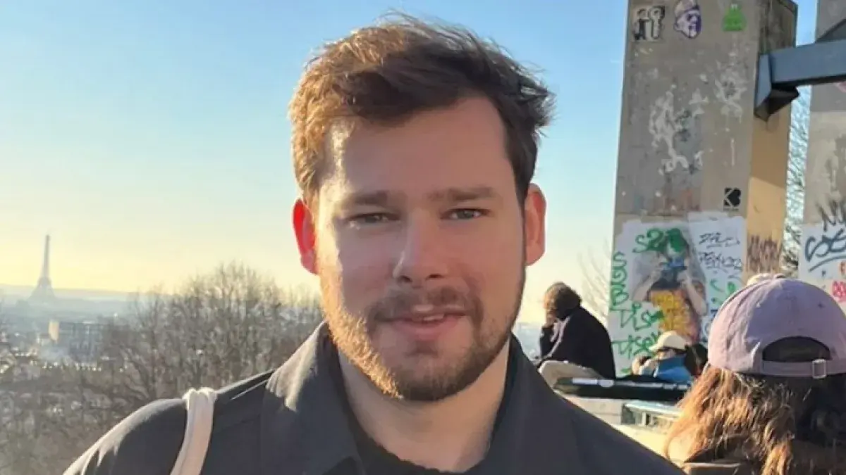 Colour head and shoulders photo of Caleb Warren-Smith