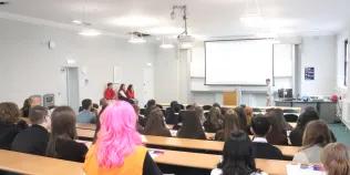 Colour photo of attendees at the 2024 Discovery Day listening to Nathanael Vette in the Elizabeth Templeton Lecture Theatre