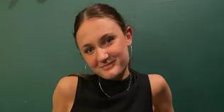 Colour head and shoulders photo of Eliza Light