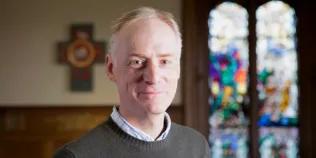 Colour head and shoulders photo of Professor Mark Harris