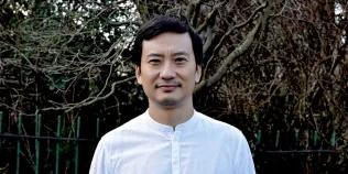 Colour head and shoulders photo of Professor Arkotong Longkumer