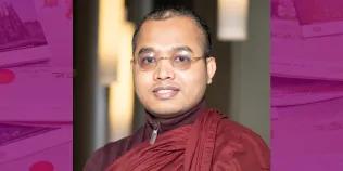 Colour head and shoulders photo of Upali Sraman