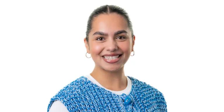 Colour head and shoulders photo of Jamilla Mohammed