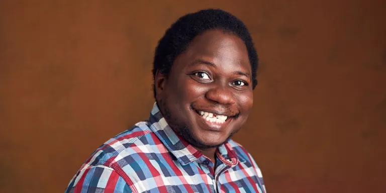 Colour head and shoulders photo of Avweroswo Akpojero