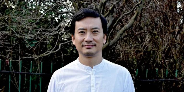 Colour head and shoulders photo of Professor Arkotong Longkumer