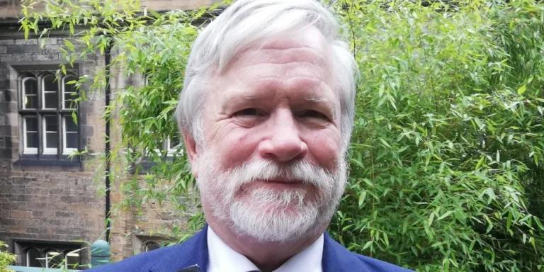 Colour head and shoulders photo of Stewart J Brown
