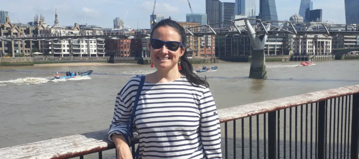 Colour photo of Amy Plender smiling at the camera