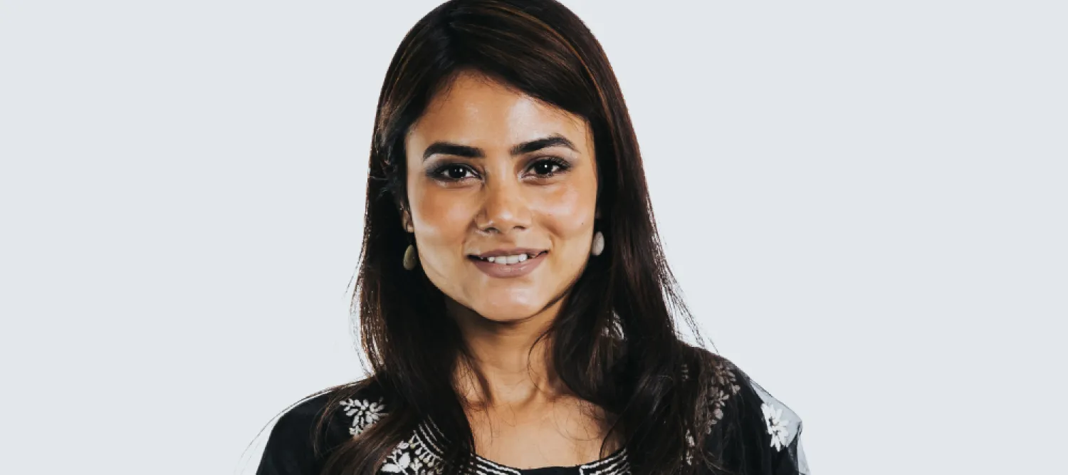 Colour head and shoulders photo of Sneha Roy