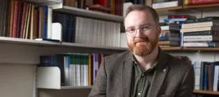 Colour head and shoulders photo of Dr James Eglinton