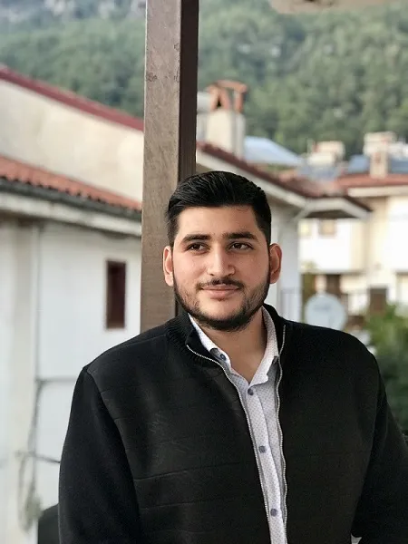 Colour head and shoulders image of Jaan Islam