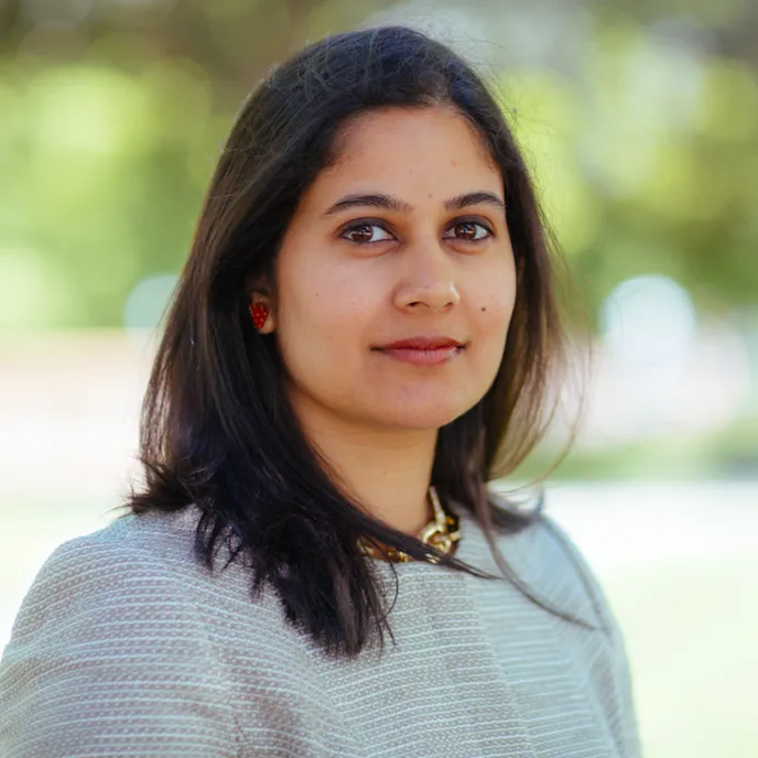 Colour head and shoulders photo of Dr Zahra Ayubi