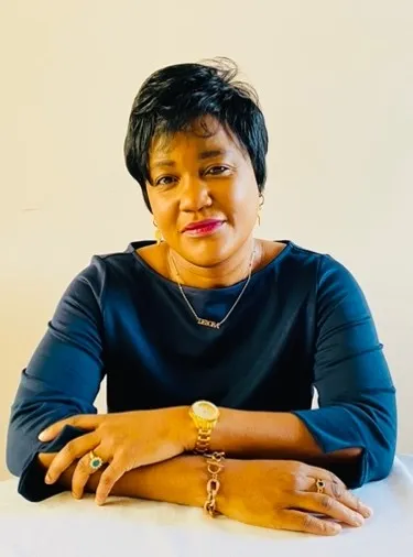 Colour head and shoulders image of Ms Deborah Kayembe