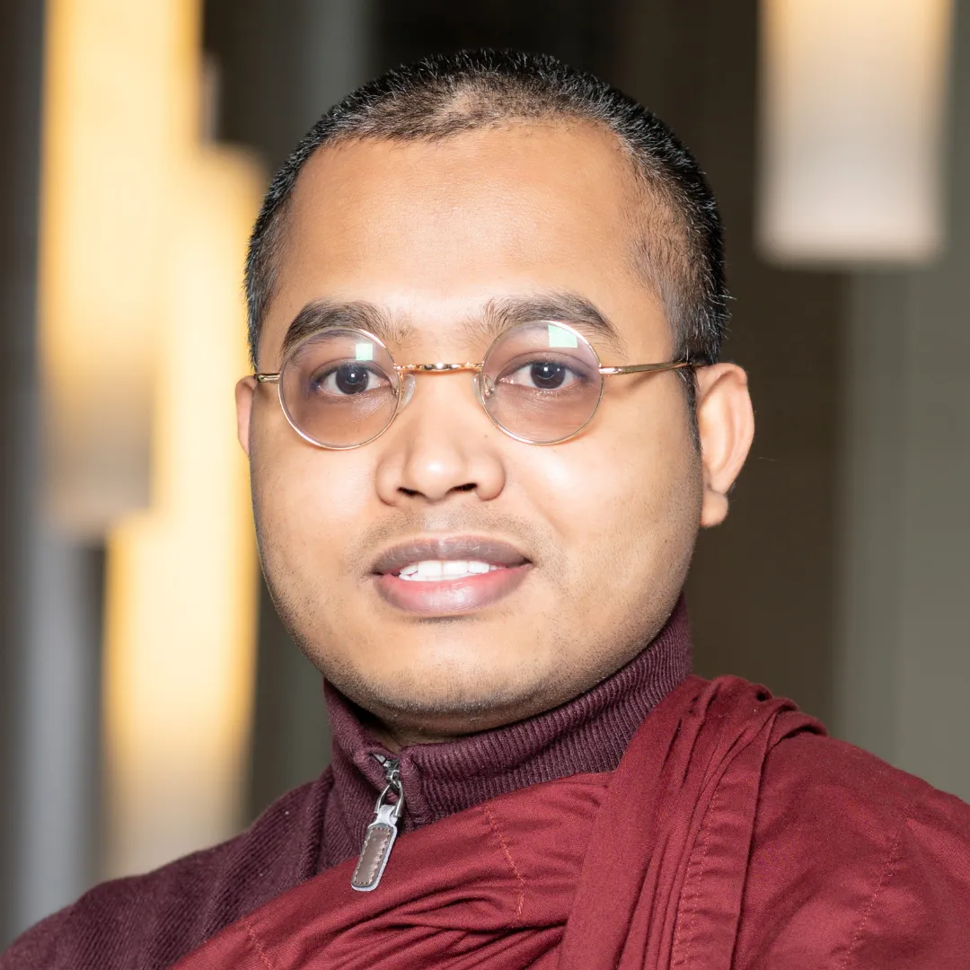 Colour head and shoulders photo of Dr Upali Sraman