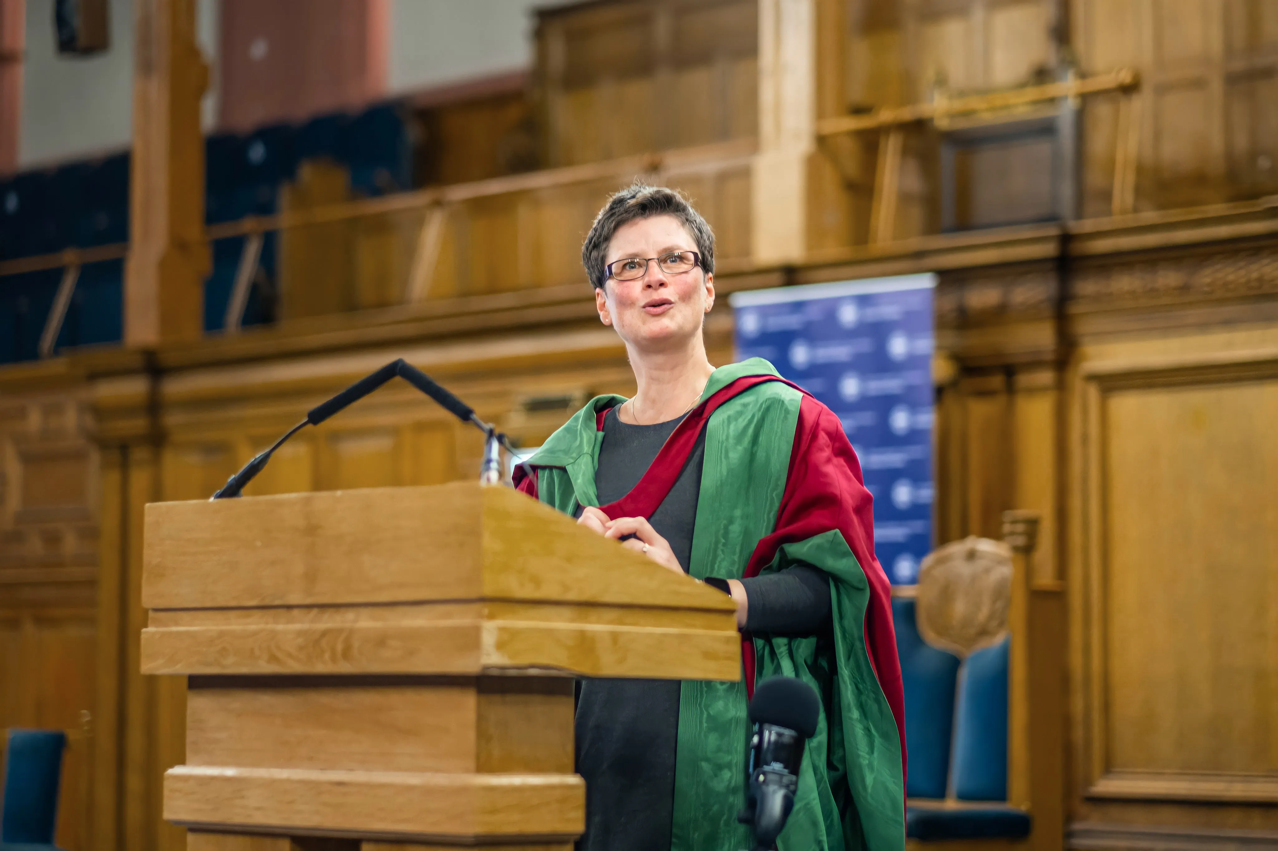 Colour head and shoulders image of Dr Hannah Holtschneider delivering the opening lecture in 2021