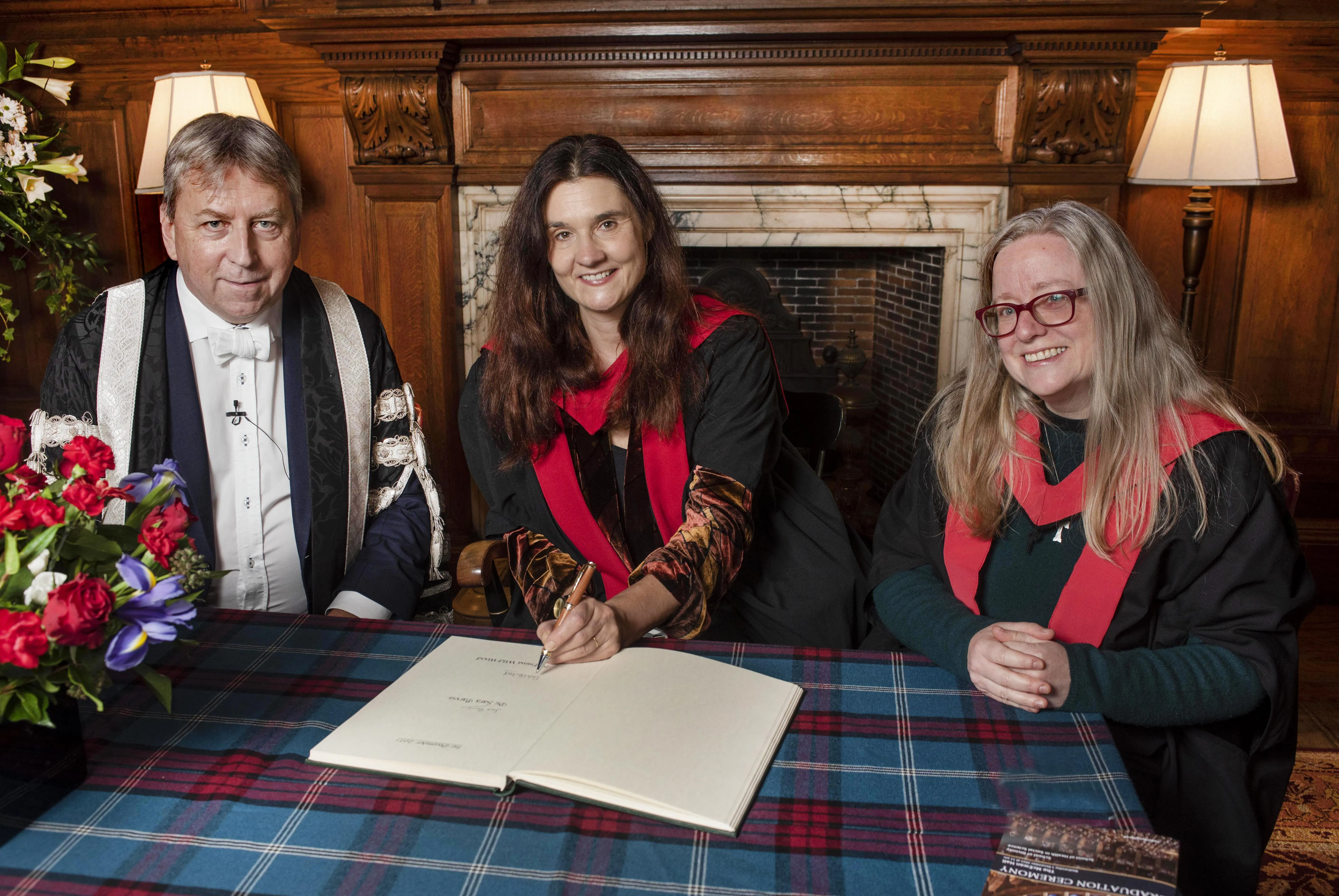 Colour head and shoulders image of Dr Emma Wild-Wood, Dr Sara Parvis with Professor Peter Mathieson