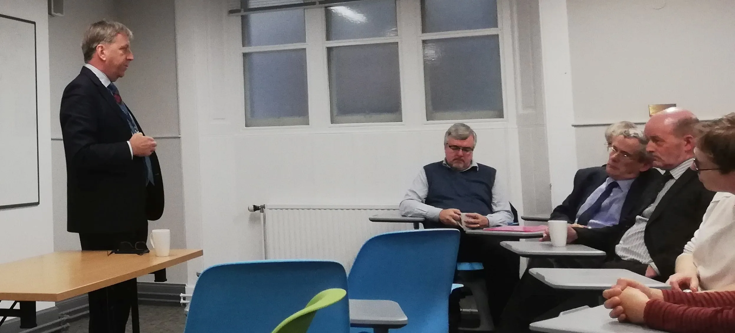 Professor Peter Mathieson speaking to Divinity staff