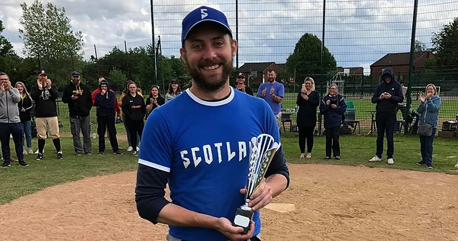 Sam Davidson with his Outstanding Pitcher award