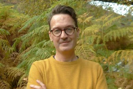 Colour head and shoulders photo of David Farrier