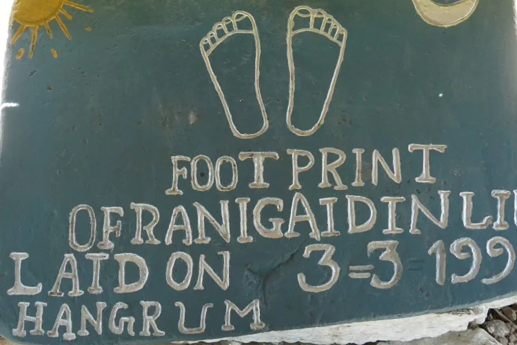 Colour photo of an impression of Gaidinliu’s feet at Hangrum villa