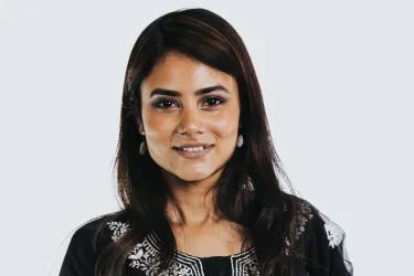 Colour head and shoulders photo of Sneha Roy