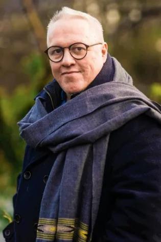 Colour head and shoulders photo of Lloyd Llewellyn-Jones