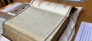 Colour photo of the New College Special Collections display at the 2022 Theology and Religious Studies Discovery Day