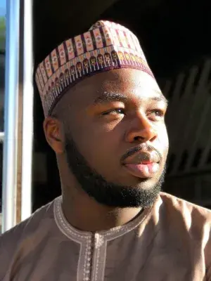 Colour head and shoulders photo of Mustafa Briggs
