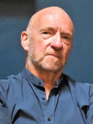 Colour photo of Randall Stevenson looking at the camera