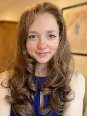 Colour photo of Dr Suzanna Millar smiling at the camera