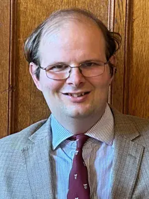 Colour head and shoulders photo of Dr Simon Burton