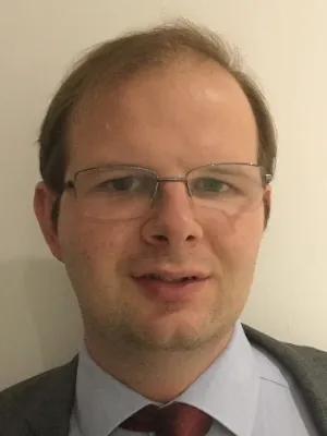 Colour head and shoulders photo of Dr Simon Burton