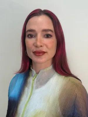 Colour head and shoulders photo of Eleanor Drage
