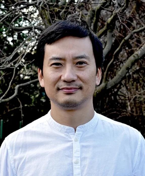 Colour head and shoulders photo of Arkotong Longkumer