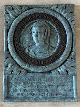 Colour photo of the Mary of Guise plaque underneath the archway in the New College Quad